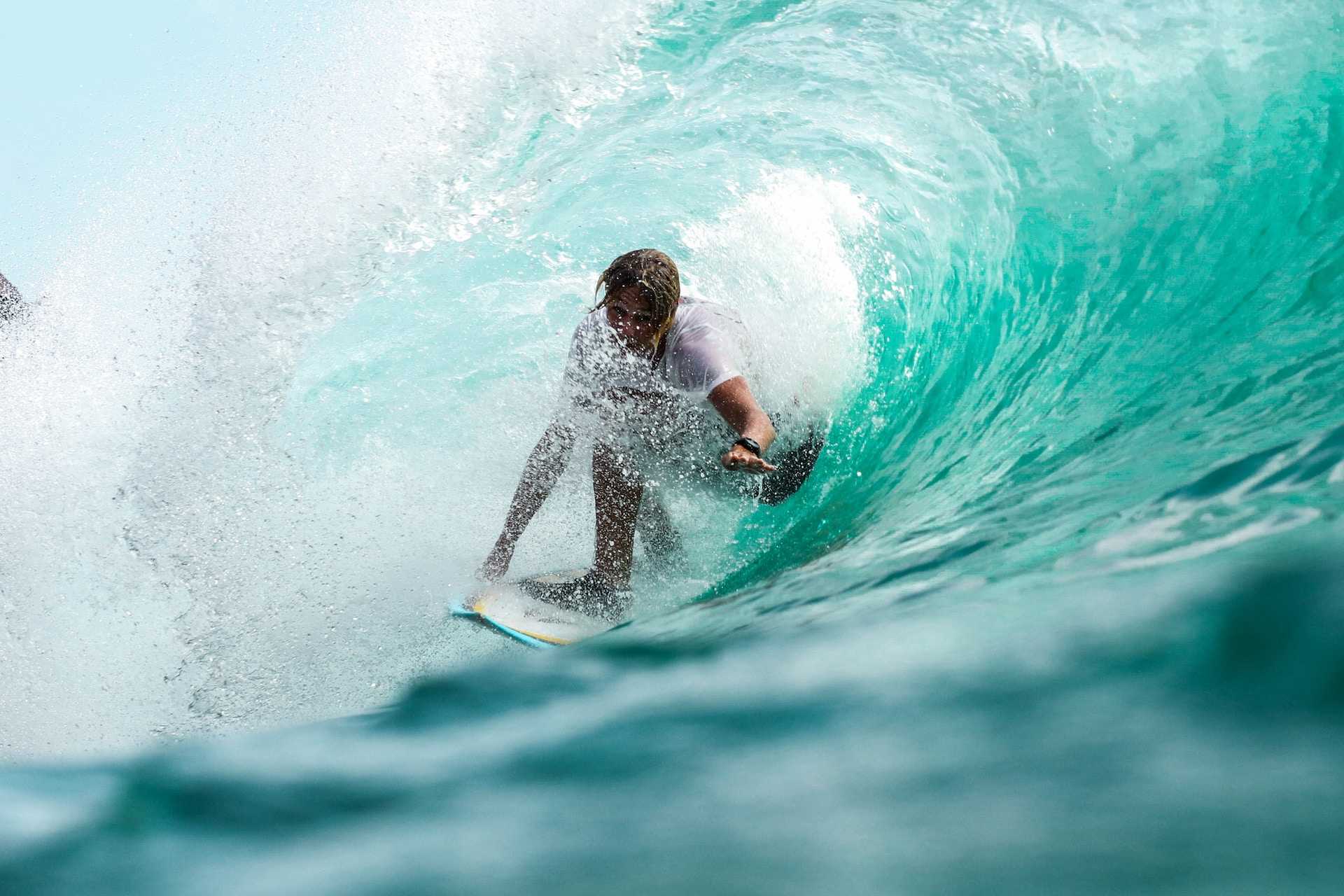 Surfer in wave, Bali